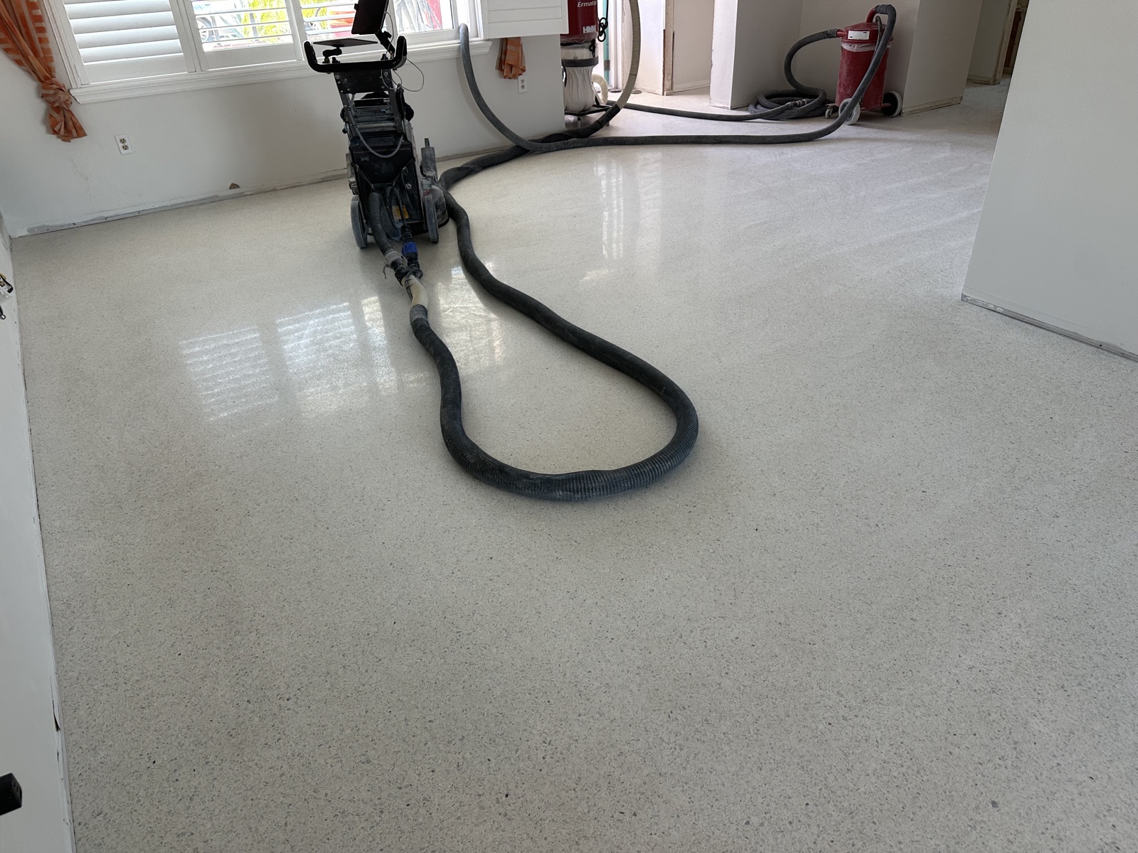 Bradenton terrazzo floor in the process of being polished