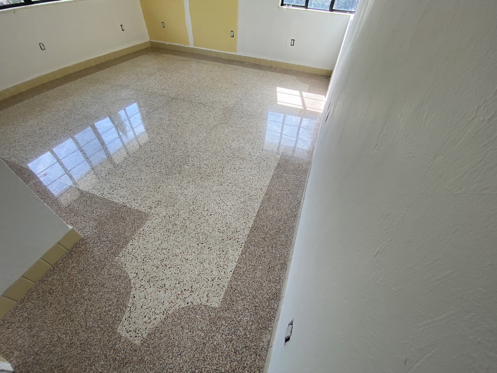 Polished terrazzo with border in The Eagle House in Bayview