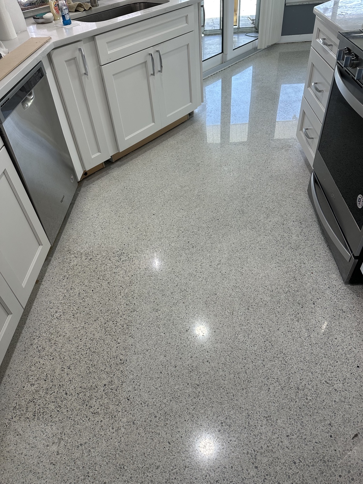 Polished terrazzo kitchen in venice with a 3 square foot patch